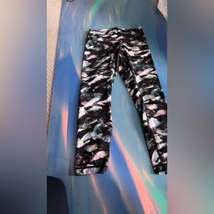 Lululemon leggings size 8. Black floral pattern.